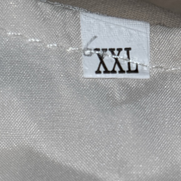 Zulily top in XXL has embossed flowers It’s  lining the sleeve are see-threw - Picture 13 of 15